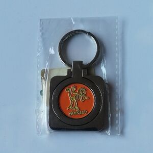 NWT Kokopelli Keyring Mexico Travel Souvenir Silvertone Orange Enamel